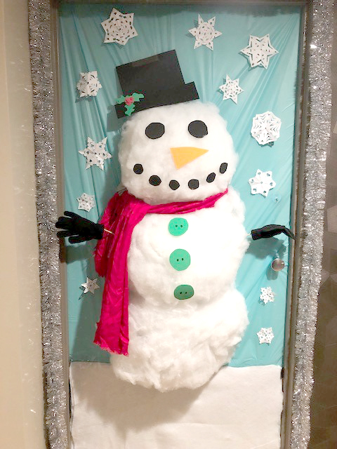 A door adorned with a snowman and snowflakes - winner!