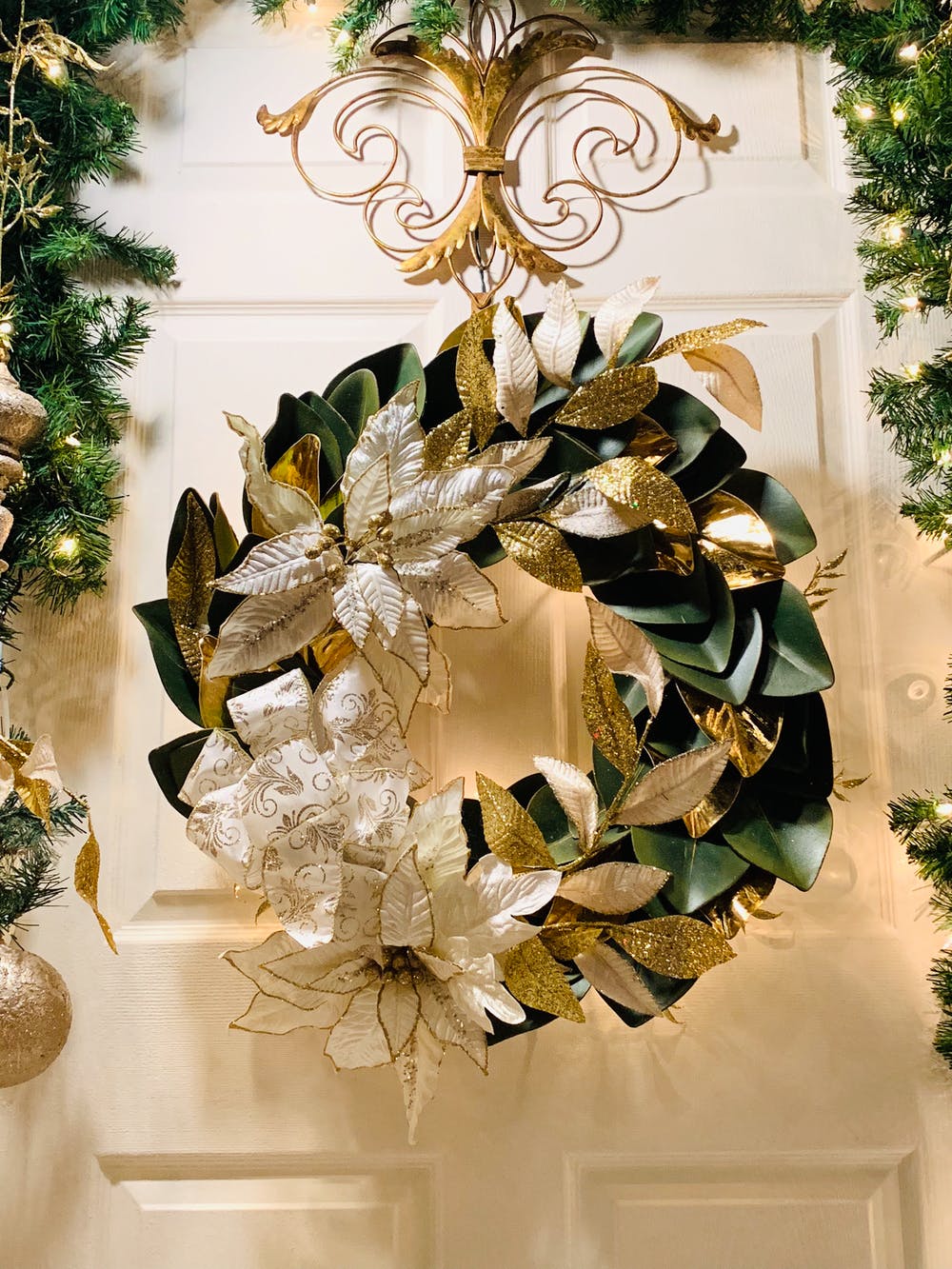 A festive wreath adorns a door as part of a Holiday Door Decorating Contest.